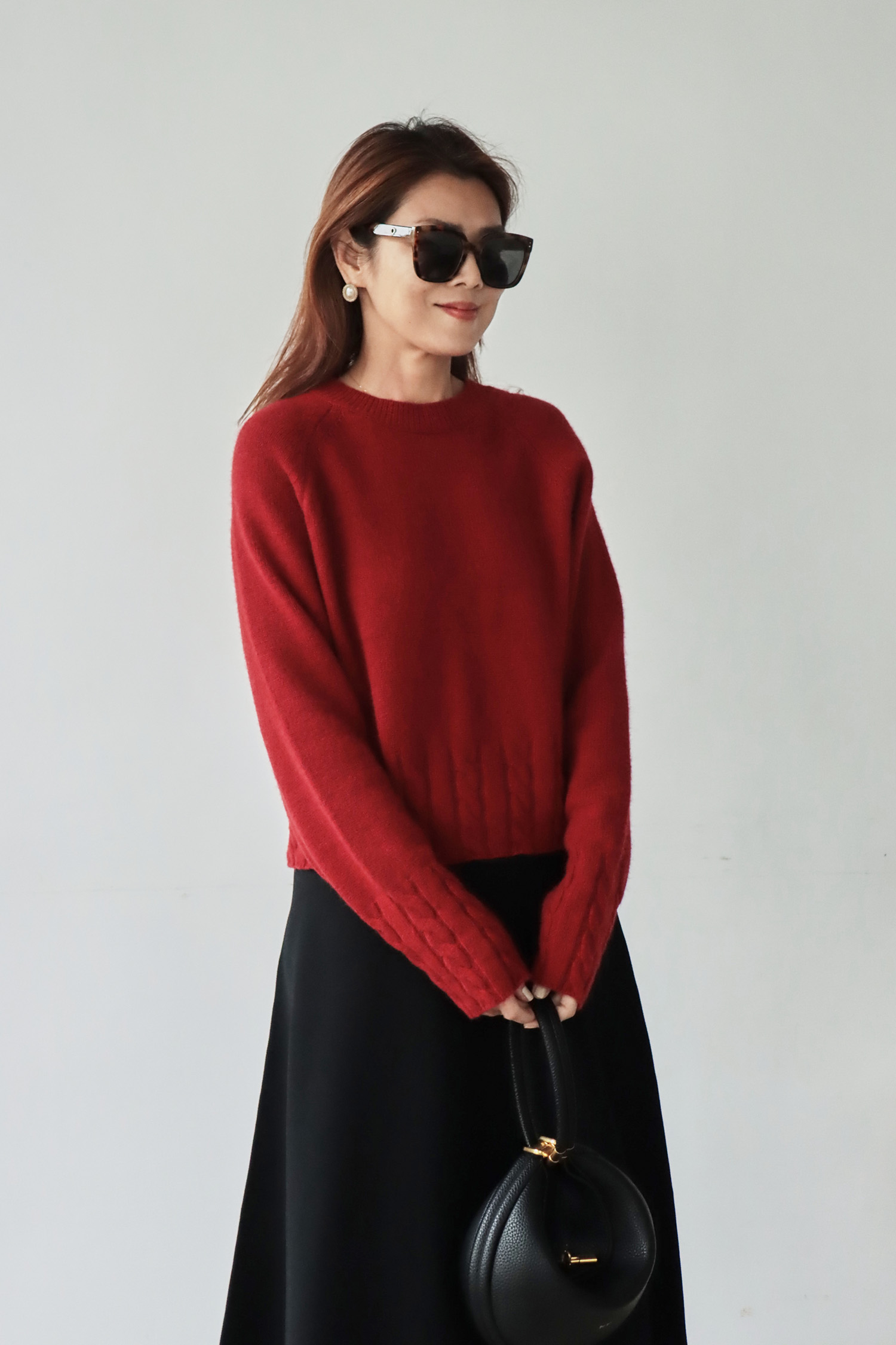 下擺麻花針織毛衣